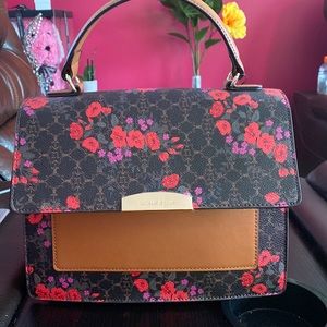 Nanette Lepore bag , never worn and inside intact .